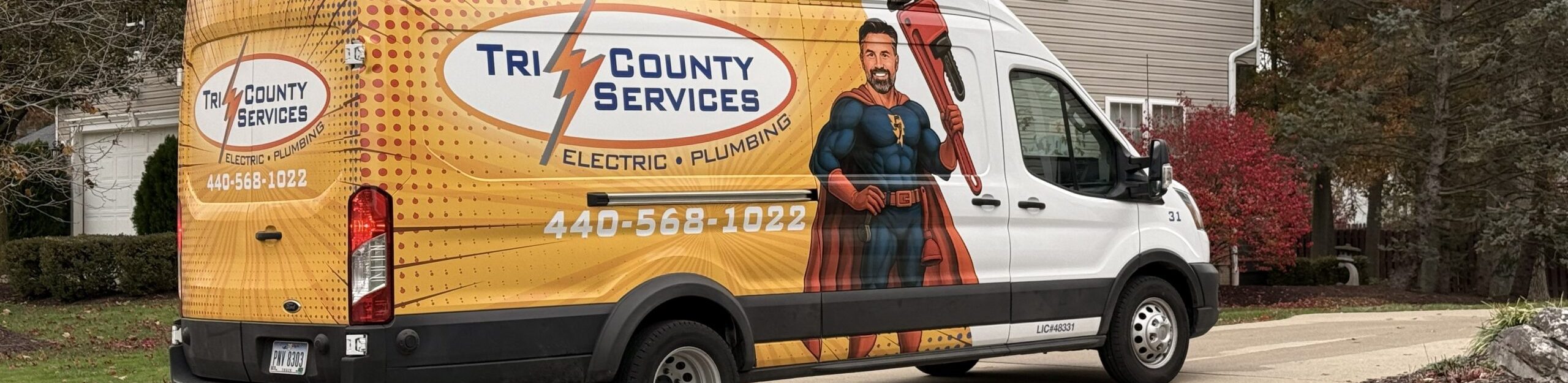 plumbing - truck in front of house 2